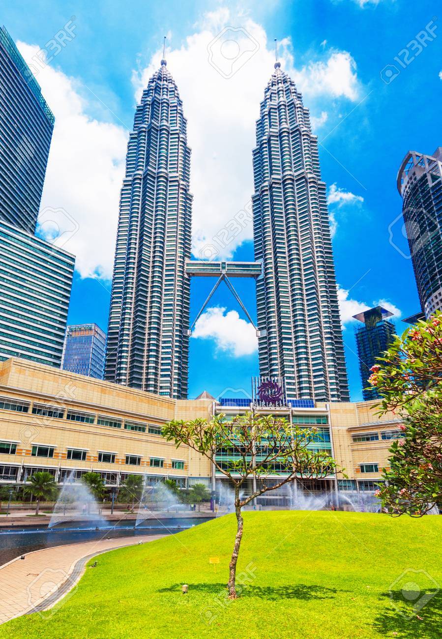 114312381 kuala lumpur malaysia february 16 2018 view of the twin towers against a blue sky vertical